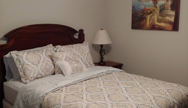 Cozy bedroom with private bathroom, and separate, direct access entrance.