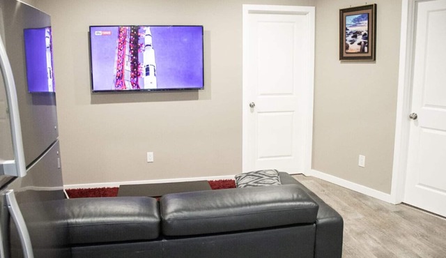 COZY BRAND NEW LEGAL SUIT IN LIVINGSTON CALGARY