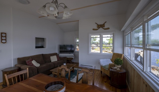 Cozy cabin on a private Island with amazing views & great fishing spot!