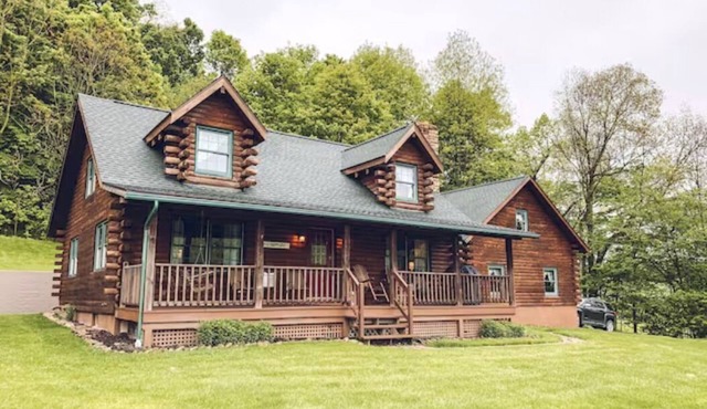 Cozy cabin on the hill with amazing surroundings.