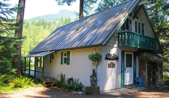 COZY CABIN ON THE SKY RIVER LOOKING UP AT THE WILD SKY WILDERNESS