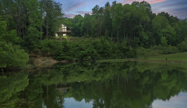 Cozy cabin retreat with private lake