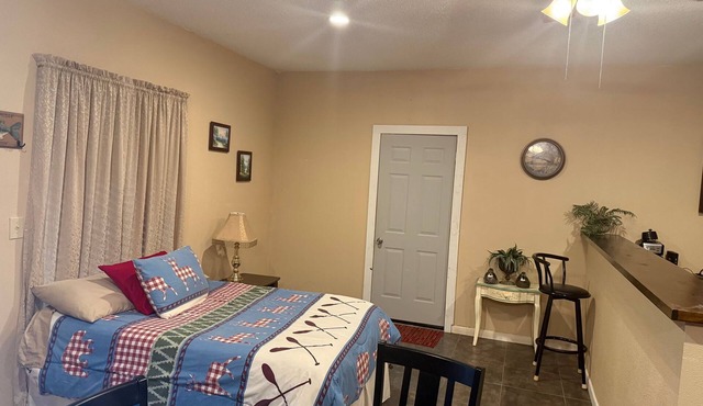 Cozy Cabin with a Private Lake in Fins & Feathers RV Park in Donalsonville GA