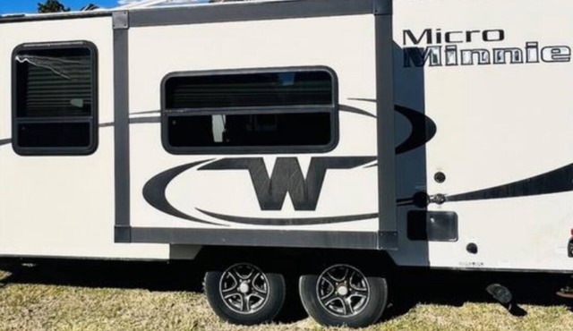 Cozy Camper in Eagle River with hot tub on deck,WiFi, AC & a breathtaking view.
