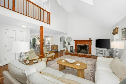 Cozy Cape Retreat with Fenced Yard Fire Pit