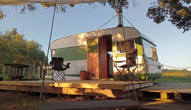 Cozy caravan retreat with great views set within 10 acre of ecological paradise.