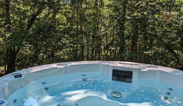 Cozy chalet in Biron with a private spa and shared pool