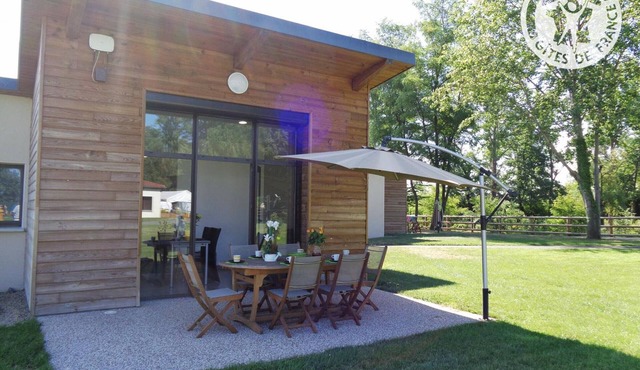 Cozy Chalets by the Pond with Terrace, Outdoor Activities, and Spa in Veauchette