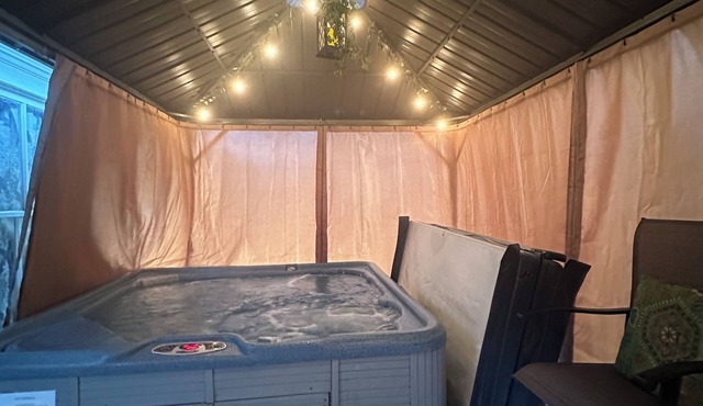 Cozy Chic of Cheboygan: Private Main Level - Hot Tub, Tanning & Massage Chair!