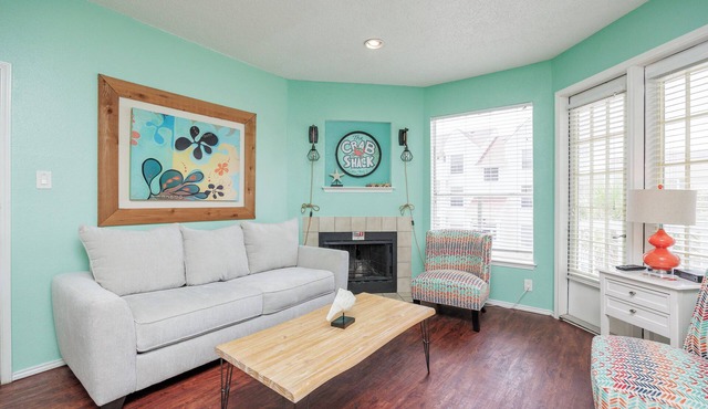 Cozy Coastal Condo with Lake Views, Heated Pool, and Easy Beach Access