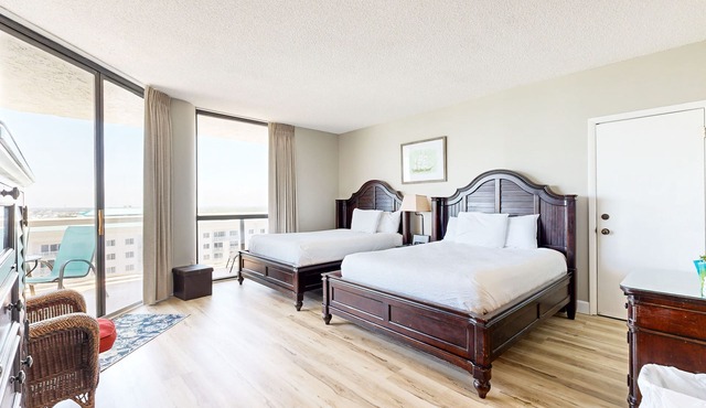 Cozy coastal condo with balcony, beach views, & resort pool