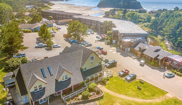 Cozy Coastal Condo Steps from the Beach with Deck Views
