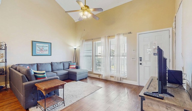 Cozy coastal condo with a loft, shared pool and beach access