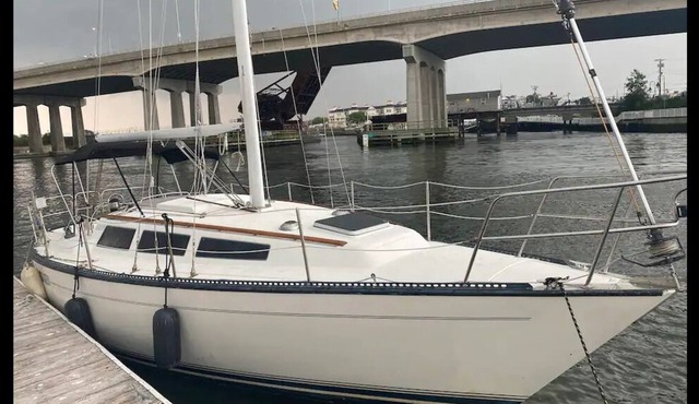 Cozy, Comfy and Quaint Black Sailboat