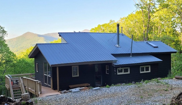 Cozy cool cabin in the mountains with a view Close to Downtown with a hot tub