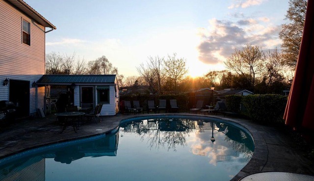 Cozy Corner Retreat - Pool, Sunroom, 0.7 Acres, 5 Minutes to the Beach