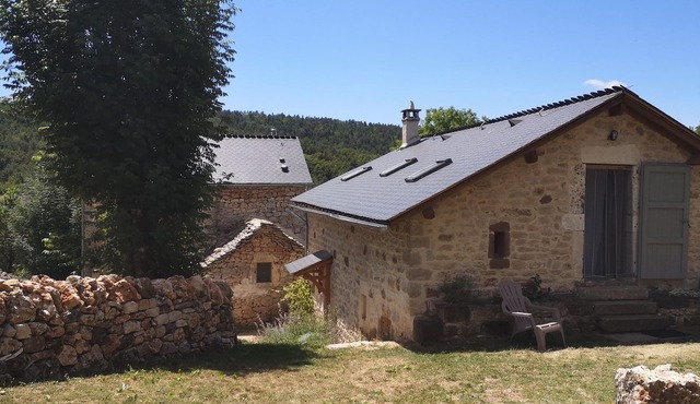 Cozy cottage between stones and modernity