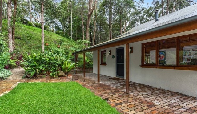 Cozy Cottage on an acreage bush setting closer to amenities.