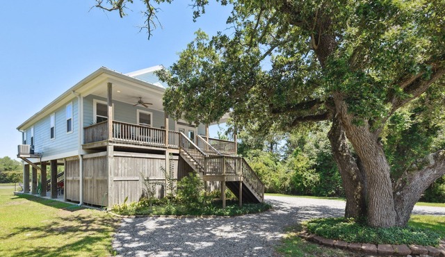 Cozy cottage surrounded by woods and just a short walk to the beach!