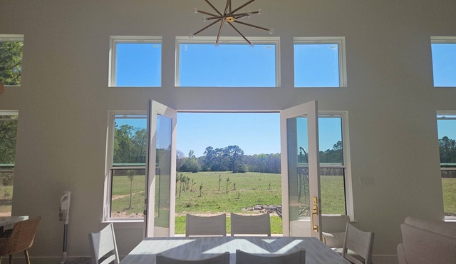 Cozy cottage with amazing forest view minutes from Lakes, trails and more!