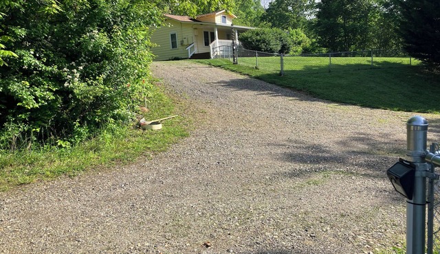 Cozy country home with great views and big porch. Family friendly great kitchen.