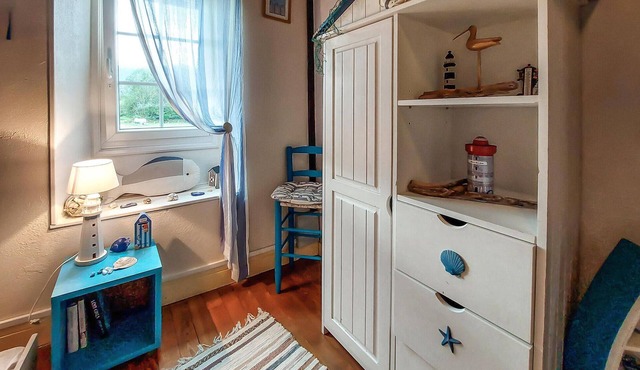 Cozy country house with well-kept garden and grounds.