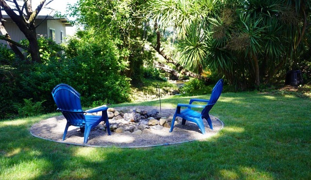 Cozy Creekside Cabin w/fire pit, steps from the beach and town
