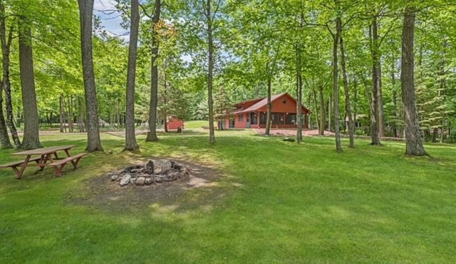 Cozy Crosby Cabin located on Rabbit Lake with great views.