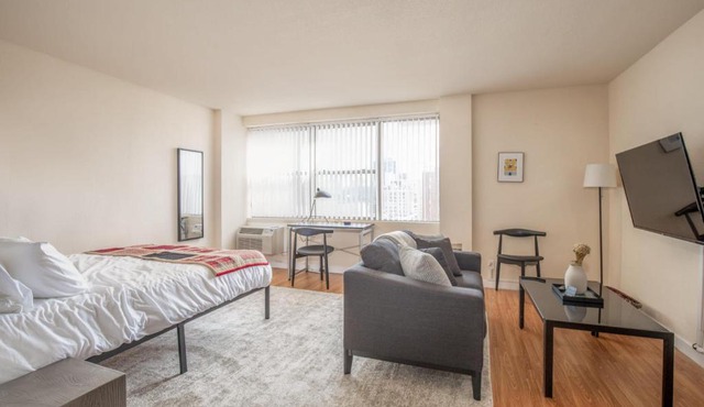 Cozy DT Studio with City View by Zencity