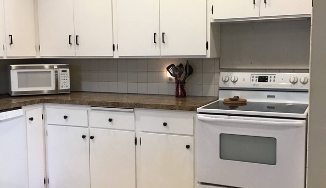 Cozy family friendly home, with large private backyard. Two family rooms.