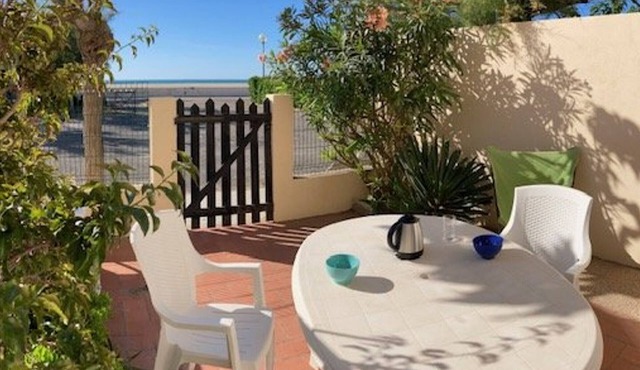 Cozy 2-Bedroom Apt in Saint Pierre La Mer, Steps from Beach, Terrace with BBQ