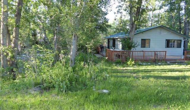 Cozy Getaway in Town! Enjoy Rock Creek Flowing Just Steps from Wrap Round Deck