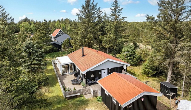Cozy holiday home with indoor hot tub and sauna in Vorupør.
