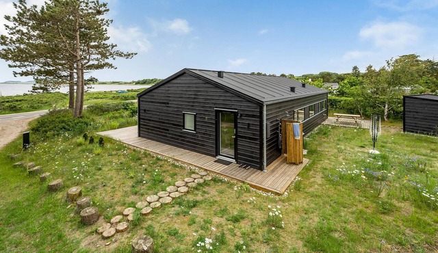 Cozy home in Knebel with house sea view