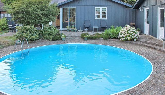 Cozy home in Sunds with private swimming pool, can be inside or outside