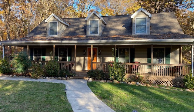 Cozy home nestled on 6 acres of wooded property!