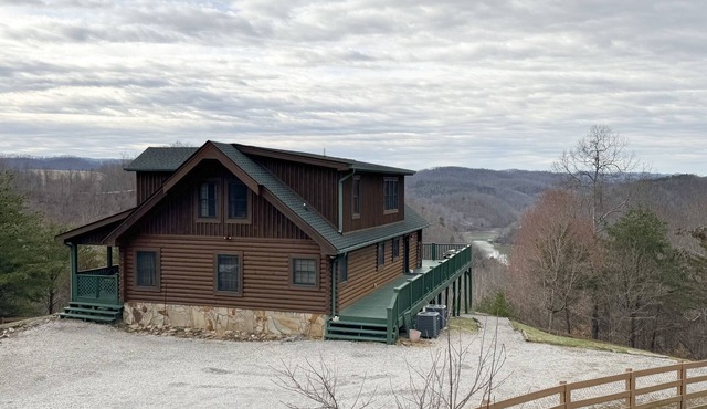 Cozy home with stunning views, fire pit, and large fenced in yard
