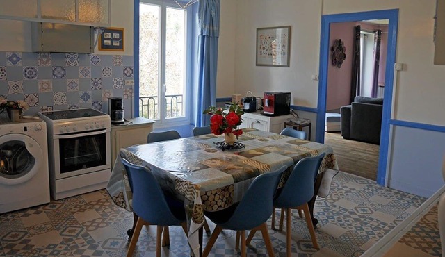 cozy house by the river in a green environment