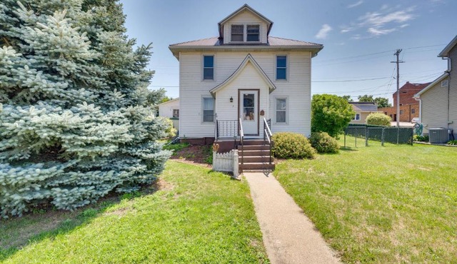Cozy Iowa Getaway with Patio and Fenced-In Yard!