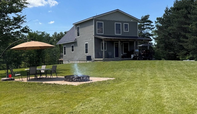 Cozy Kingston Cottage - 3-bedroom Lodge with AC, Peloton Bike, WiFi, and More