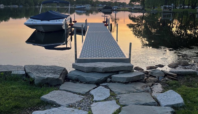 Cozy Lake Escape with Dock, Firepit, & Fenced Yard