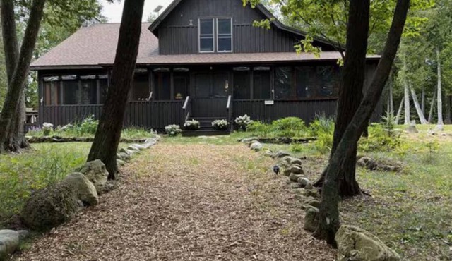 Cozy Lake Home Located on Marquette Island Surrounded by Water Beautiful Sunsets