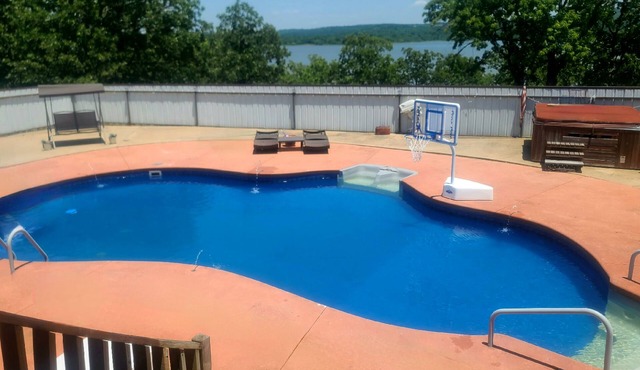 Cozy Lake home with pool, hot tub, private dock, game room and more!