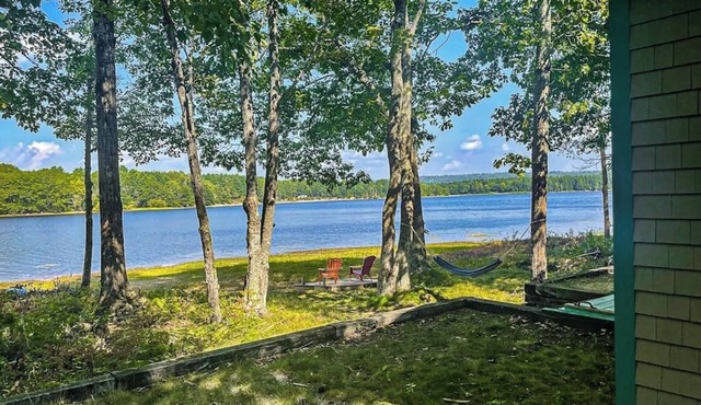 Cozy lakefront cabin with amazing views, deck, firepit, & water access