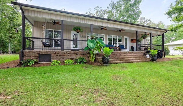 Cozy lakefront home with beautiful views, fire pit & private dock.