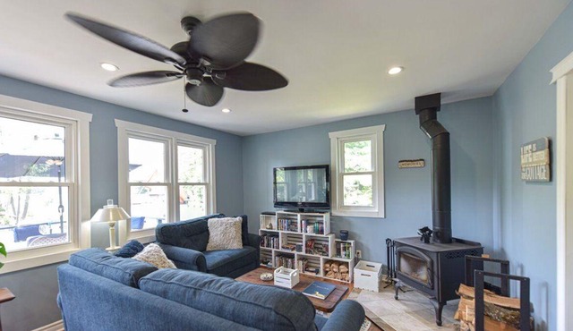 Cozy Lakeside Cottage Retreat with Kayaks, Paddle Boat & Sunset Waterfront Views