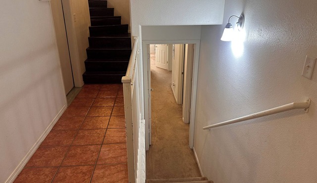 Cozy large home with. Downstairs with a closed door will be the rented space