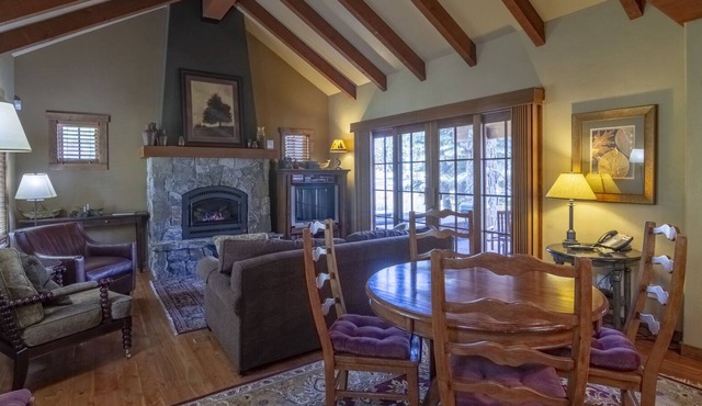 Cozy Living Room w/ Stone Fireplace | POMA Lift Access | Private Hot Tub & Patio
