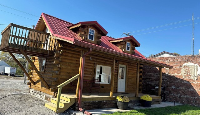 Cozy log cabin located in downtown Moravia, Iowa.