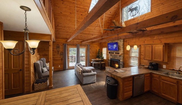 Cozy Log Cabin overlooking a pond with a fire pit, game area and rustic charm